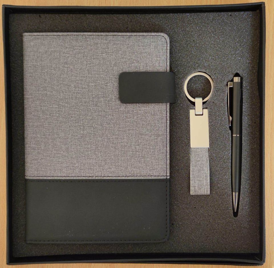 set of (Notebook ,pen and keychain )